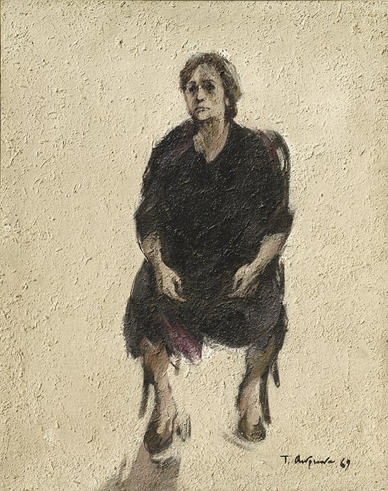 Woman sitting on a chair